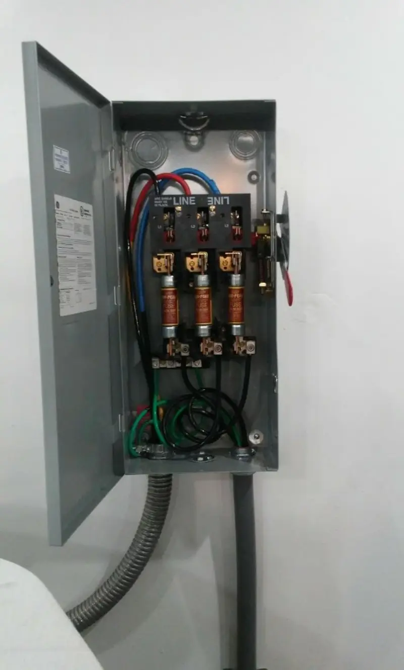 Three-phase disconnect switch installed for Smoke Detector Installation in Osprey